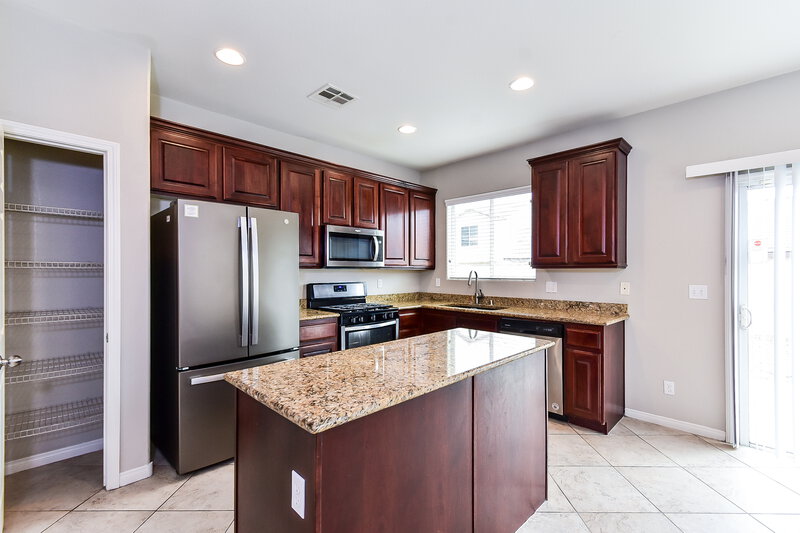 1,950/Mo, 3921 Red Trumpet Ct North Las Vegas, NV 89081 Kitchen View