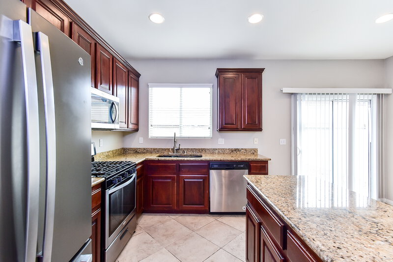 1,950/Mo, 3921 Red Trumpet Ct North Las Vegas, NV 89081 Kitchen View 2