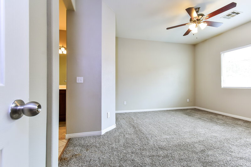 1,950/Mo, 3921 Red Trumpet Ct North Las Vegas, NV 89081 Primary Bedroom View